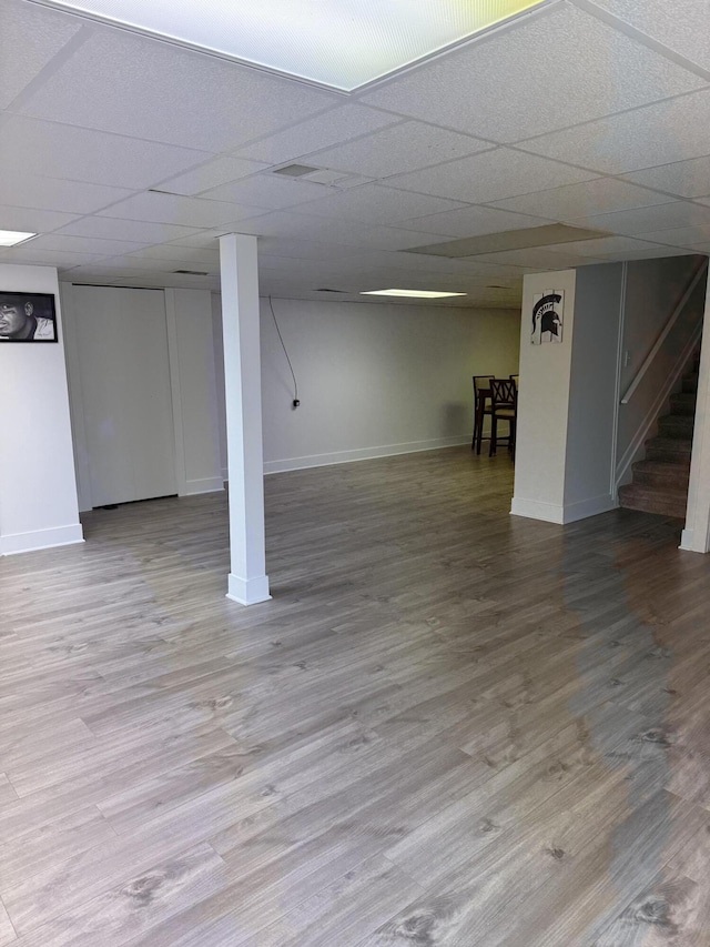 5653 Powder Horn Dr, West Bloomfield, MI 48322 - finished below grade area featuring stairs, wood finished floors, and a drop ceiling