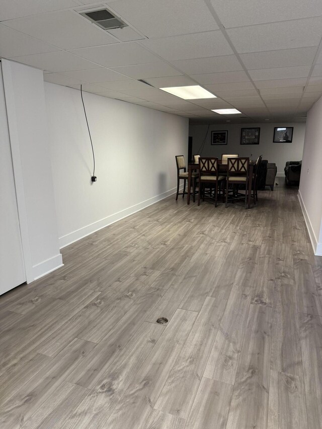 5653 Powder Horn Dr, West Bloomfield, MI 48322 - dining area featuring wood finished floors and a paneled ceiling