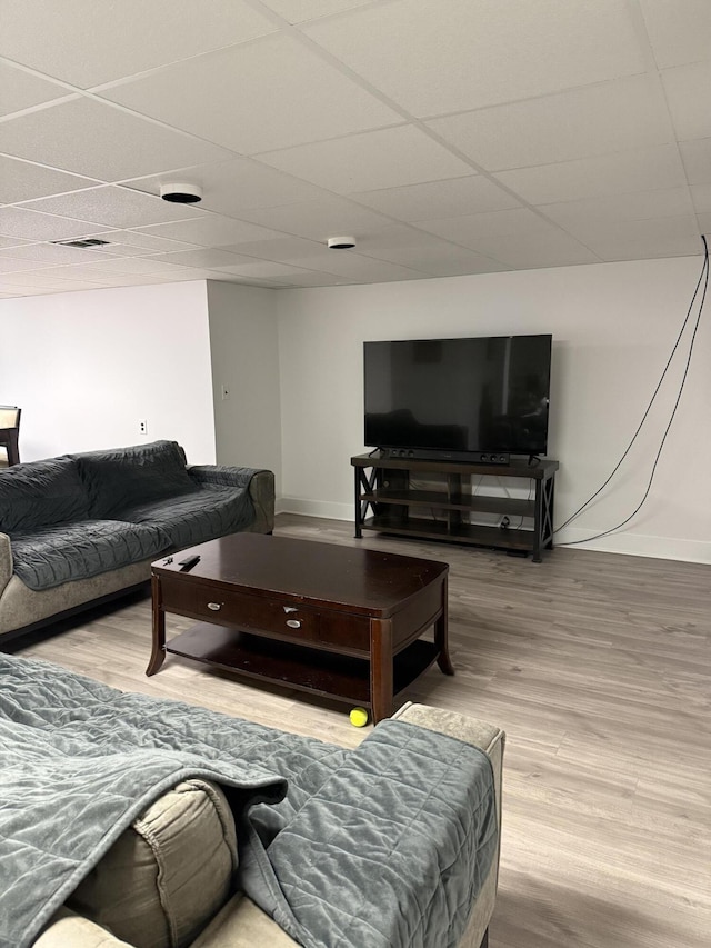 5653 Powder Horn Dr, West Bloomfield, MI 48322 - living room with wood finished floors and a paneled ceiling
