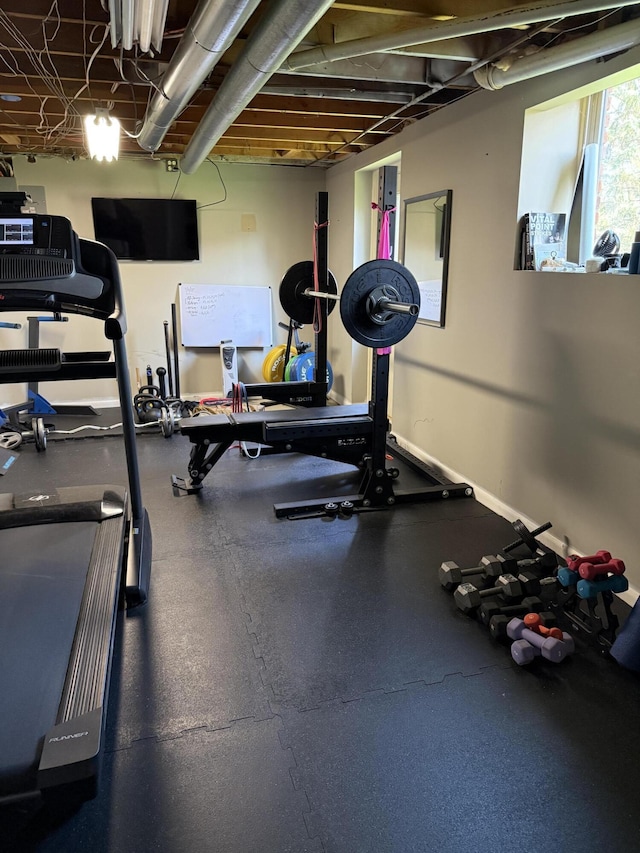 5653 Powder Horn Dr, West Bloomfield, MI 48322 - workout room with baseboards