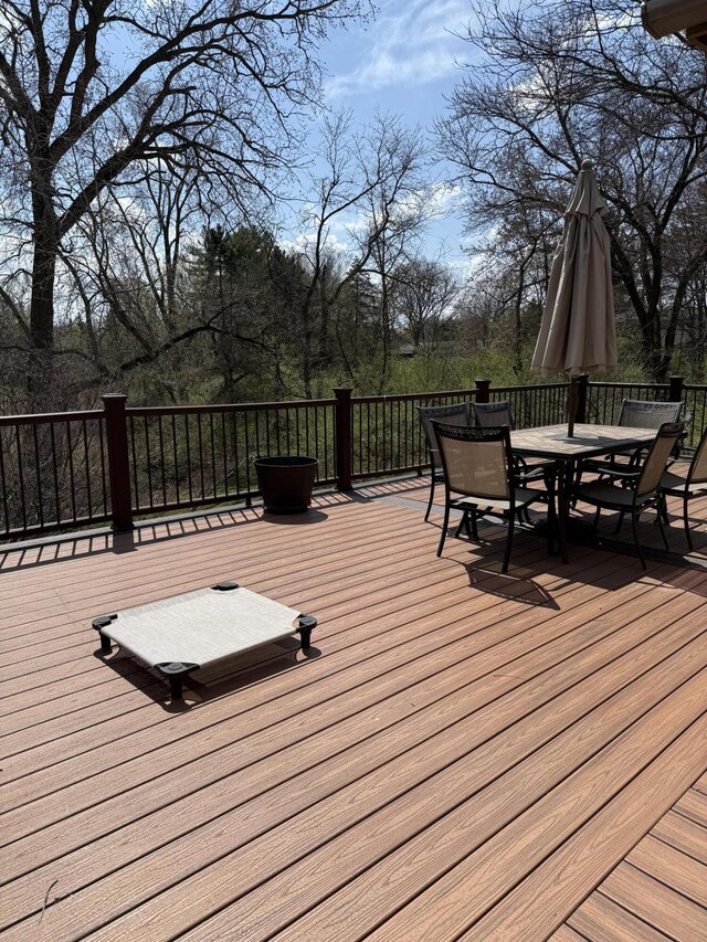 5653 Powder Horn Dr, West Bloomfield, MI 48322 - wooden deck with outdoor dining space