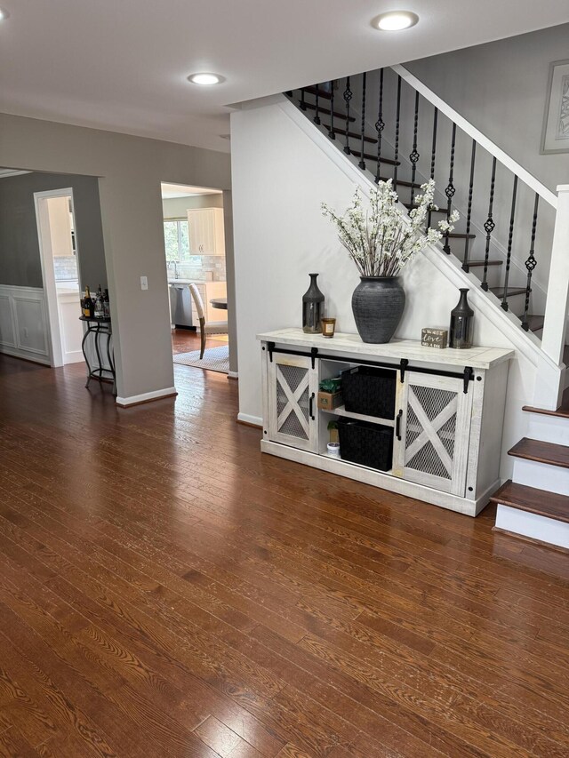 5653 Powder Horn Dr, West Bloomfield, MI 48322 - stairway with wood finished floors and recessed lighting