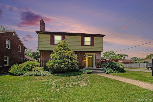 16251 Prest St, Detroit, MI 48235 - colonial inspired home with a chimney and brick siding