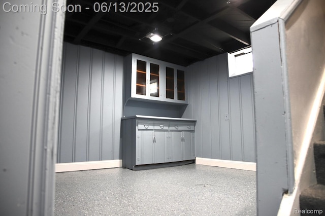 9037 Longacre St, Detroit, MI 48228 - kitchen featuring glass insert cabinets and speckle patterned floor