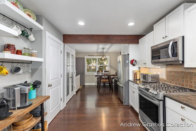 1142 Orchard Ave SE, Grand Rapids, MI 49506 - kitchen featuring stainless steel appliances, tasteful backsplash, white cabinetry, dark wood finished floors, and beam ceiling