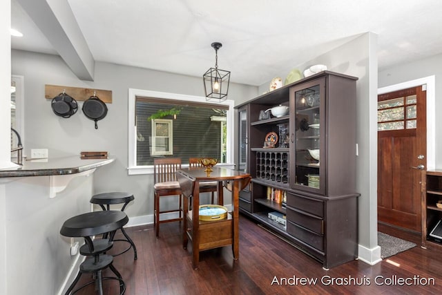 1142 Orchard Ave SE, Grand Rapids, MI 49506 - dining room featuring dark wood finished floors and healthy amount of natural light