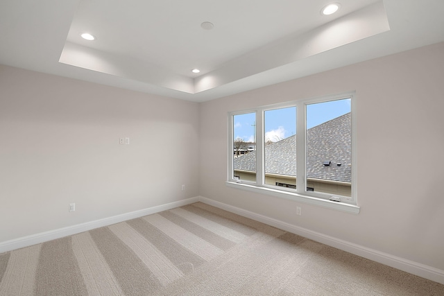 7479 Gramercy Cir W, Bloomfield, MI 48322 - unfurnished room with a tray ceiling, recessed lighting, and light colored carpet