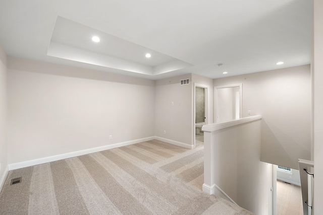 7479 Gramercy Cir W, Bloomfield, MI 48322 - unfurnished room with recessed lighting, light carpet, and a tray ceiling
