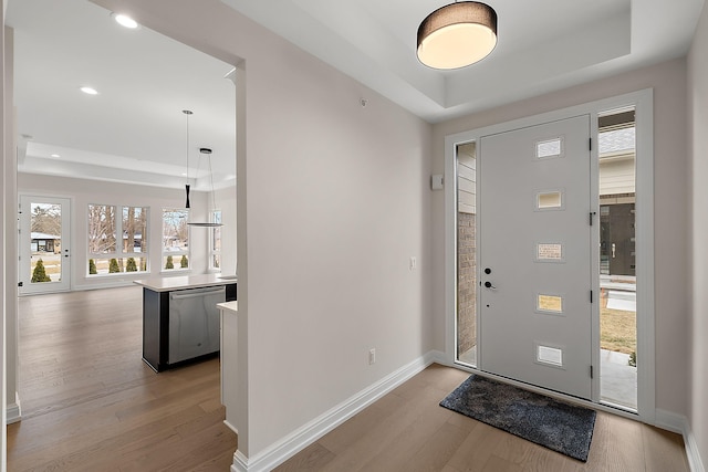 7479 Gramercy Cir W, Bloomfield, MI 48322 - foyer featuring a tray ceiling, light wood-style floors, and recessed lighting