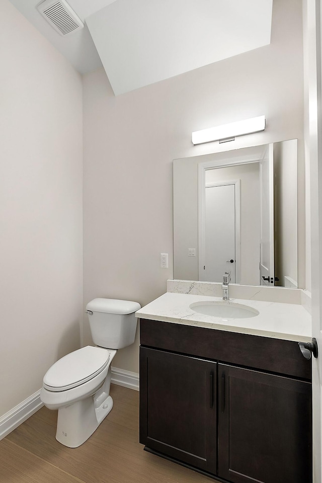7479 Gramercy Cir W, Bloomfield, MI 48322 - half bath with vanity and wood finished floors