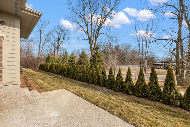 7479 Gramercy Cir W, Bloomfield, MI 48322 - view of grassy yard featuring a patio