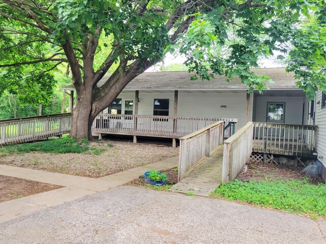 10765 Northland Dr, Big Rapids, MI 49307 - view of front of house with a porch