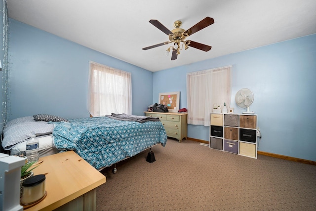 10765 Northland Dr, Big Rapids, MI 49307 - bedroom with carpet floors and ceiling fan