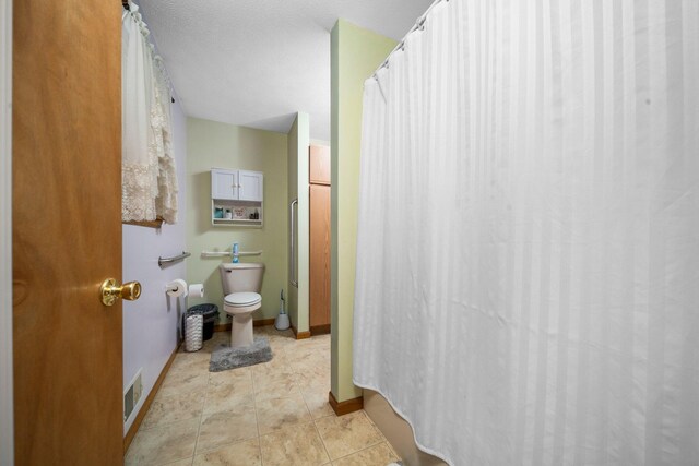 10765 Northland Dr, Big Rapids, MI 49307 - full bath featuring a shower with shower curtain