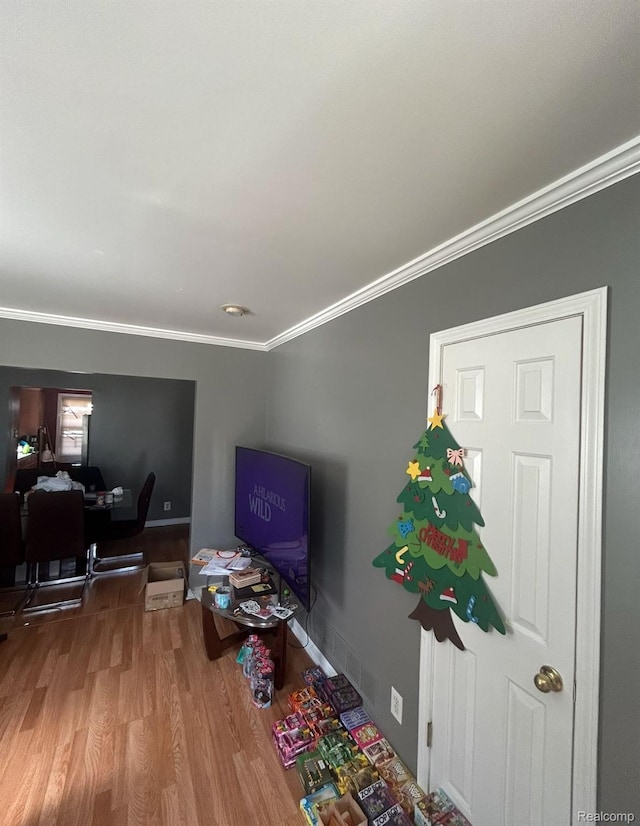 11701 Forrer St, Detroit, MI 48227 - living area featuring ornamental molding, an office area, and wood finished floors