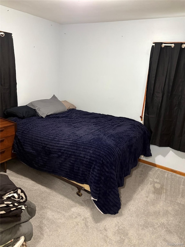 620 Wilmot St, Vassar, MI 48768 - bedroom featuring carpet