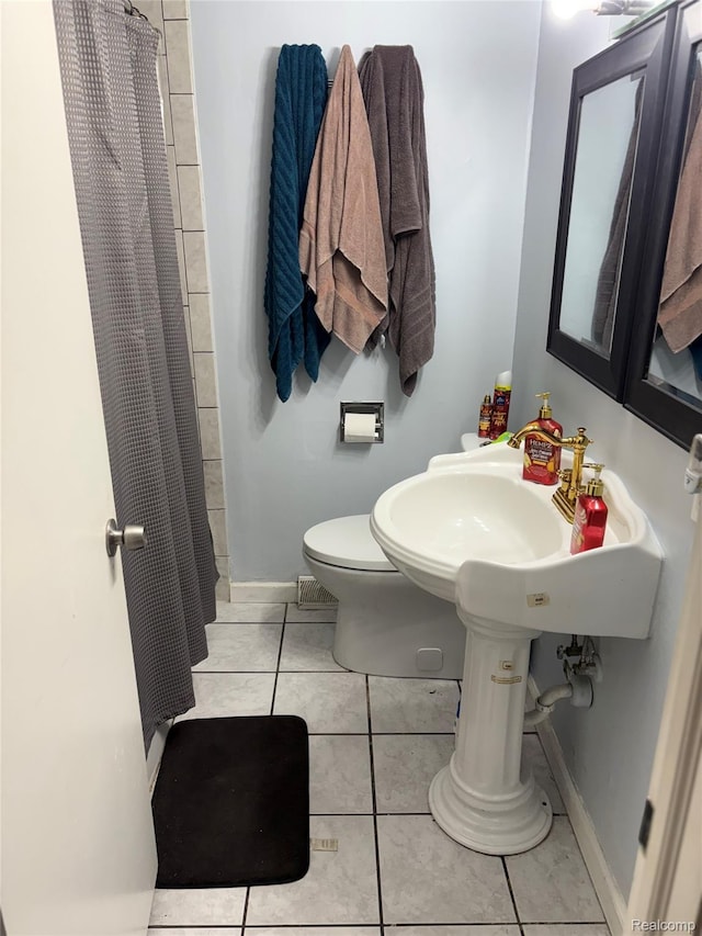 620 Wilmot St, Vassar, MI 48768 - full bathroom with tile patterned flooring and curtained shower