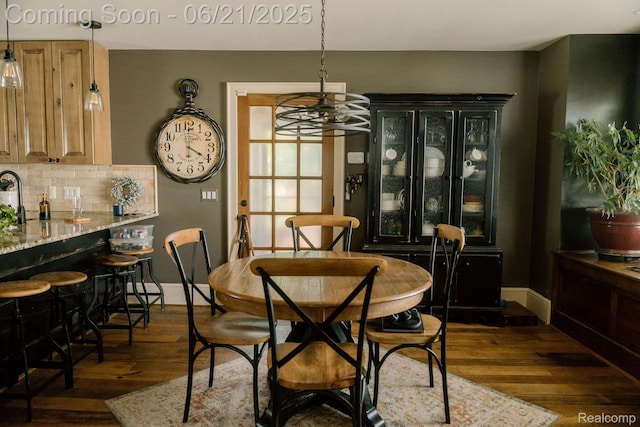 619 E Farnum Ave, Royal Oak, MI 48067 - dining area featuring a chandelier and dark wood-type flooring