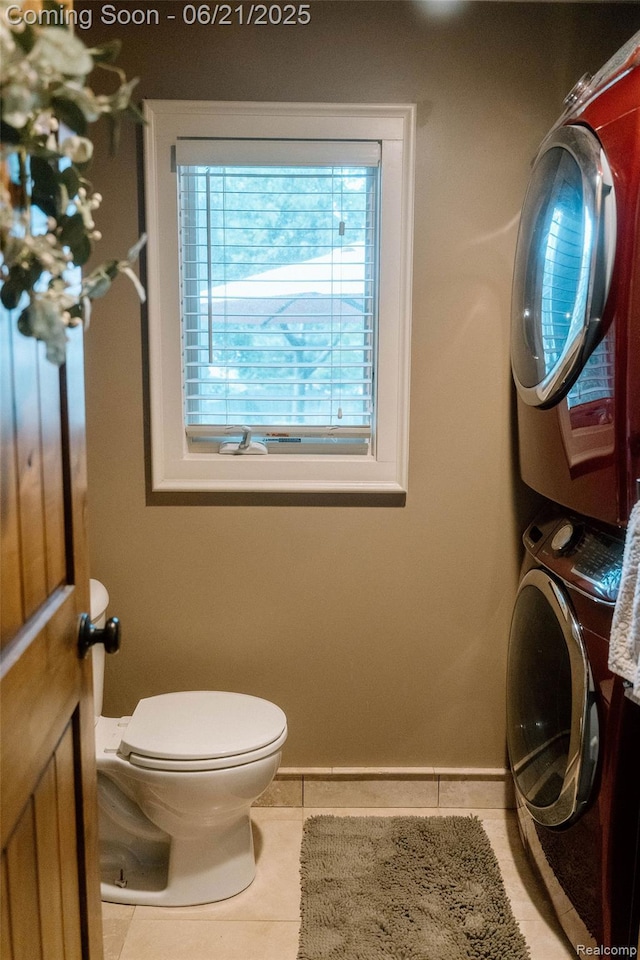 619 E Farnum Ave, Royal Oak, MI 48067 - half bathroom with stacked washer and clothes dryer and tile patterned floors