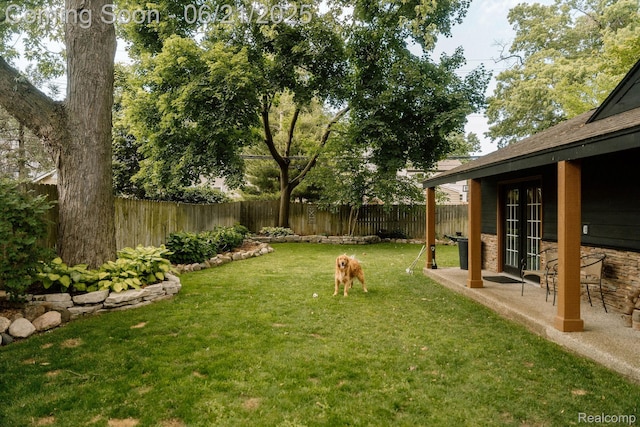 619 E Farnum Ave, Royal Oak, MI 48067 - fenced backyard with french doors and a patio area