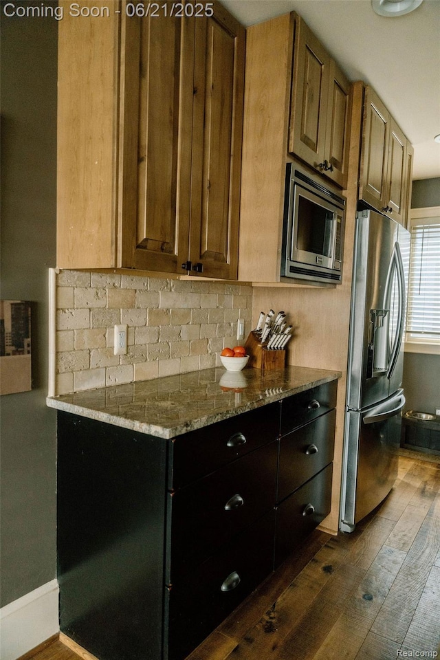 619 E Farnum Ave, Royal Oak, MI 48067 - kitchen with appliances with stainless steel finishes, dark wood-style floors, decorative backsplash, and stone countertops