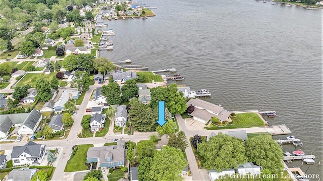 1194 Beach Dr, Holland, MI 49423 - aerial overview of property's location featuring a nearby body of water and nearby suburban area
