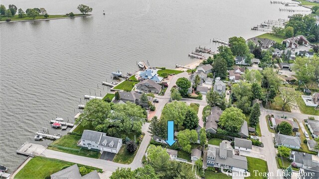 1194 Beach Dr, Holland, MI 49423 - view of property location featuring a large body of water, nearby suburban area, and numerous boat docks