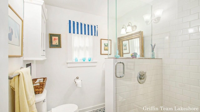 1194 Beach Dr, Holland, MI 49423 - bathroom with a shower stall and toilet
