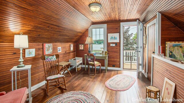 1194 Beach Dr, Holland, MI 49423 - living area with wooden ceiling, wood walls, lofted ceiling, and hardwood / wood-style flooring