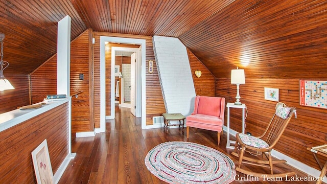 1194 Beach Dr, Holland, MI 49423 - sitting room featuring wood ceiling, vaulted ceiling, wooden walls, and wood finished floors