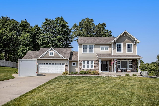 7990 Hemel Ln, Richland, MI 49083 - craftsman-style house featuring stone siding, a porch, driveway, and an attached garage