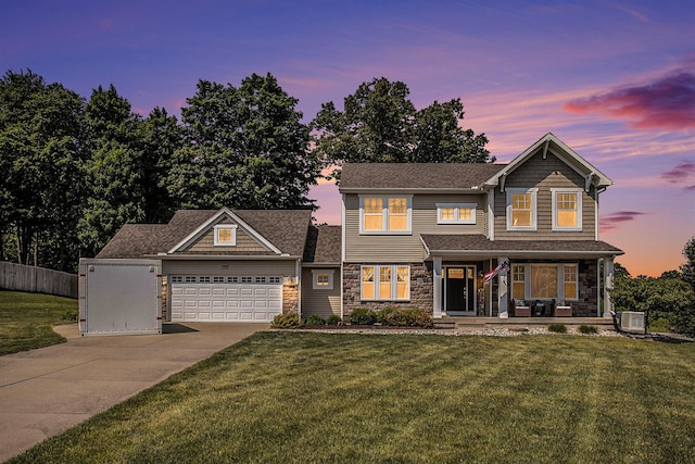 7990 Hemel Ln, Richland, MI 49083 - craftsman-style home featuring stone siding, concrete driveway, a garage, and a porch
