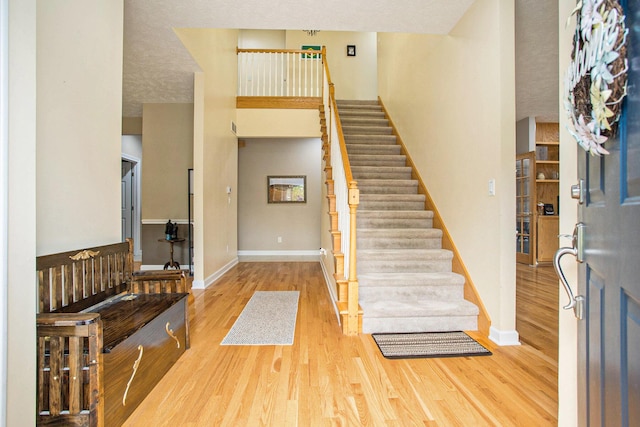 17872 Victors Ln, Marshall, MI 49068 - foyer featuring wood finished floors and stairs