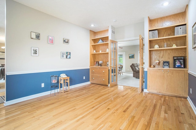 17872 Victors Ln, Marshall, MI 49068 - bar area with wood finished floors, french doors, and recessed lighting