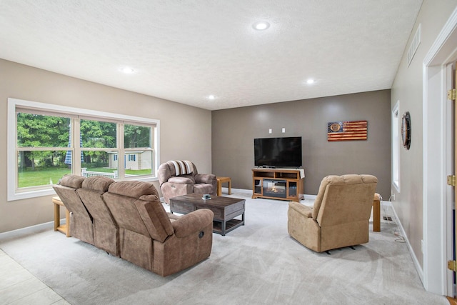 17872 Victors Ln, Marshall, MI 49068 - living room with light colored carpet, recessed lighting, and a textured ceiling