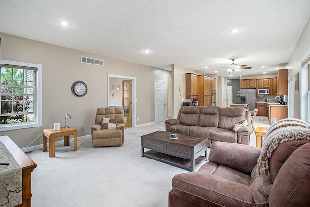 17872 Victors Ln, Marshall, MI 49068 - living area with light carpet, recessed lighting, and ceiling fan