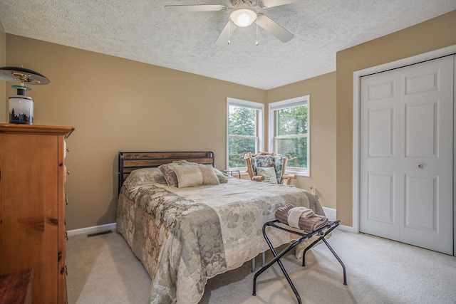 17872 Victors Ln, Marshall, MI 49068 - bedroom featuring light carpet, a textured ceiling, and a ceiling fan