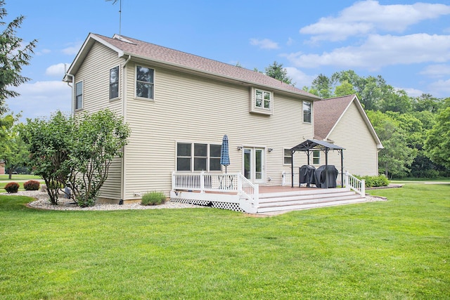 17872 Victors Ln, Marshall, MI 49068 - back of property with a deck and a lawn