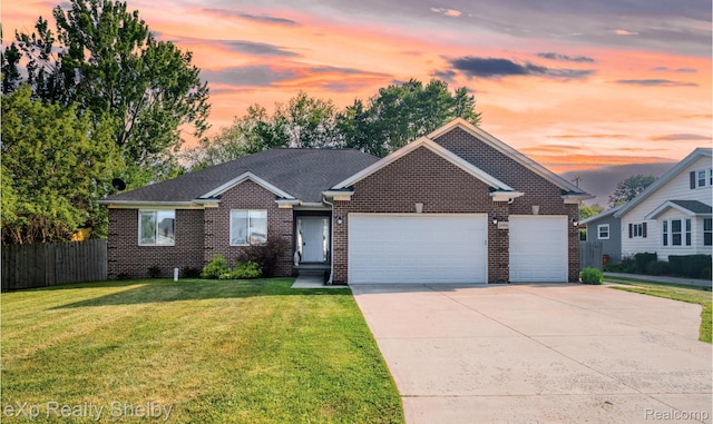 24986 Murray St, Harrison Township, MI 48045 - view of front of property featuring an attached garage, driveway, and brick siding
