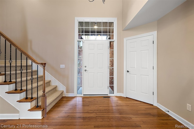 4013 Ardsley Ct, Clarkston, MI 48348 - foyer featuring wood finished floors and stairway