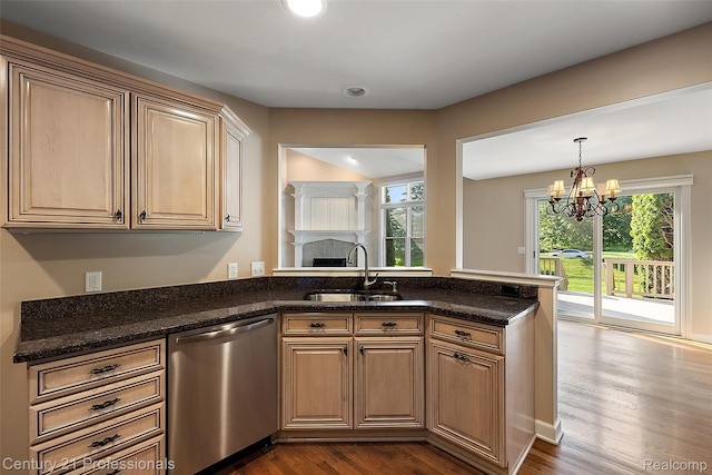 4013 Ardsley Ct, Clarkston, MI 48348 - kitchen with stainless steel dishwasher, healthy amount of natural light, and dark wood-style flooring