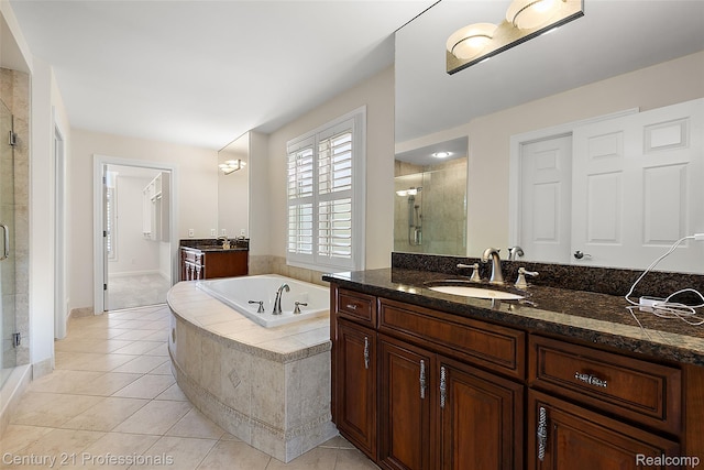 4013 Ardsley Ct, Clarkston, MI 48348 - full bathroom with a shower stall, vanity, a bath, and tile patterned floors