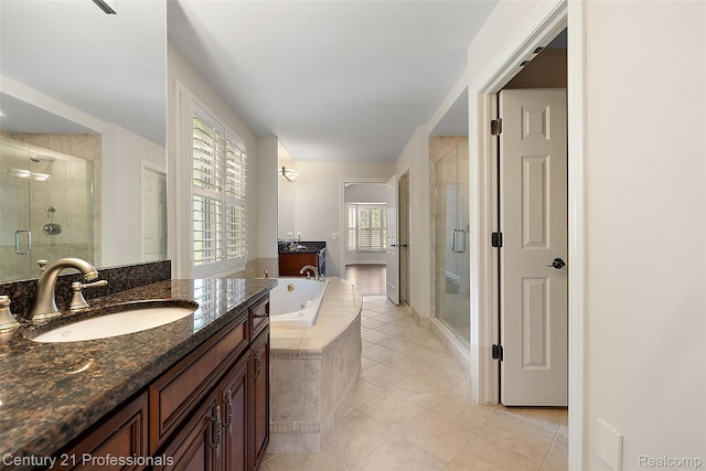 4013 Ardsley Ct, Clarkston, MI 48348 - full bathroom featuring a stall shower, a whirlpool tub, vanity, and tile patterned flooring