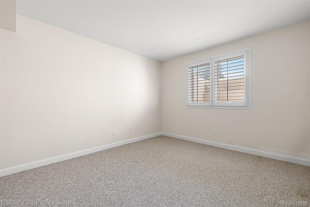 4013 Ardsley Ct, Clarkston, MI 48348 - spare room featuring carpet flooring and baseboards