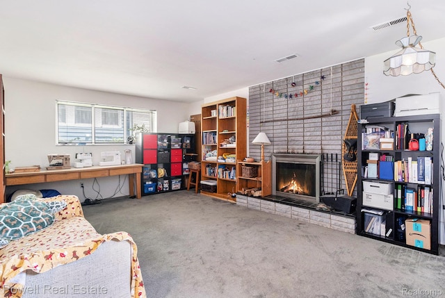2830 Colony, Ann Arbor, MI 48104 - living room featuring carpet floors and a fireplace