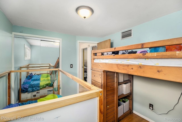 2830 Colony, Ann Arbor, MI 48104 - bedroom featuring wood finished floors and a closet