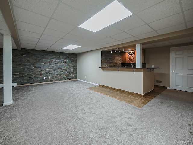 8595 Eastway Dr, White Lake, MI 48386 - finished basement with carpet floors, a drop ceiling, and bar