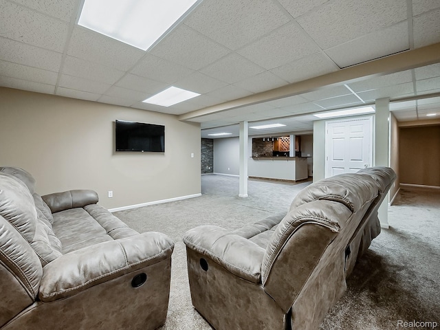 8595 Eastway Dr, White Lake, MI 48386 - carpeted living room featuring baseboards and a drop ceiling