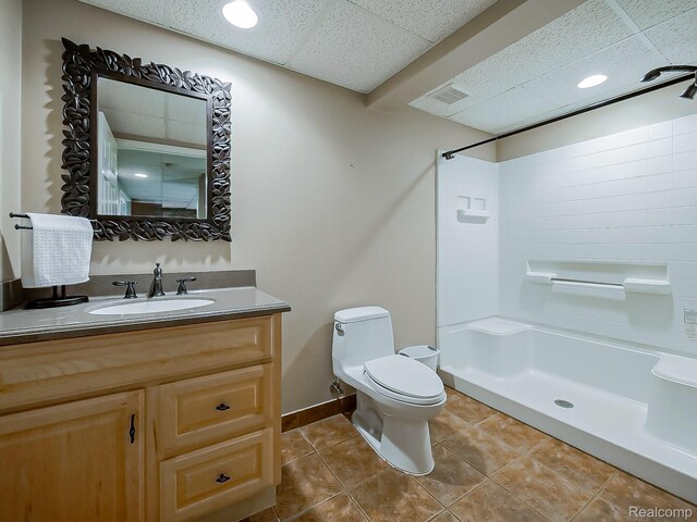 8595 Eastway Dr, White Lake, MI 48386 - bathroom featuring tile patterned floors, a shower, and vanity