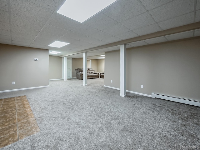 8595 Eastway Dr, White Lake, MI 48386 - finished below grade area featuring carpet, a drop ceiling, and baseboard heating